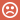 A frowning face on top of the color red.