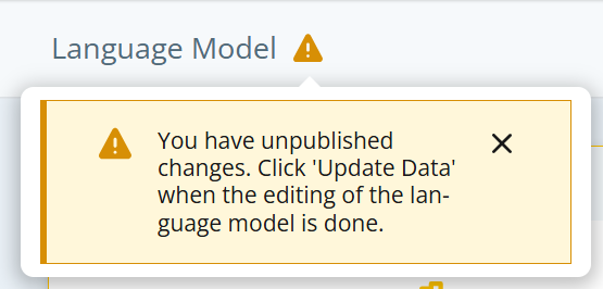 Notificação de aviso amarela para atualização de dados, que inclui um X no canto para descartar a mensagem.